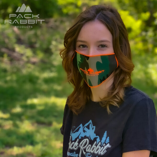 camo face mask worn by woman